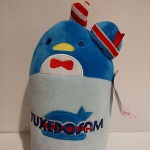 Embrace the charm of Sanrio with this delightful Hello Kitty TuxedoSam plush. 